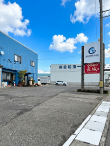 SJK Japan company parking area, staff housing, and signage